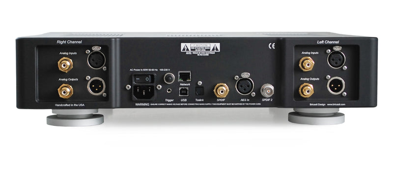 Bricasti M12 Source Controller in black finish, rear panel with analog inputs and outputs