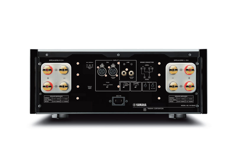 Yamaha M-5000 rear panel — balanced XLR and RCA inputs, trigger connectors, and screw-type speaker terminals