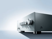 Yamaha A-S701 integrated amplifier — front panel detail showing volume, input selector, and Pure Direct controls