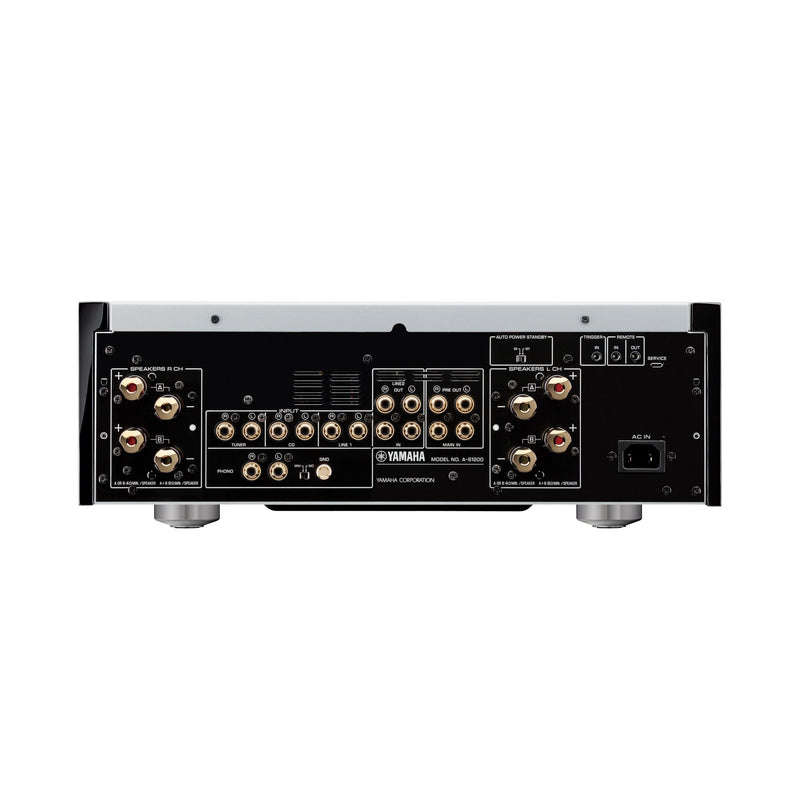 Yamaha A-S1200 rear panel showing RCA inputs, phono stage selector, speaker binding posts, and PRE OUT